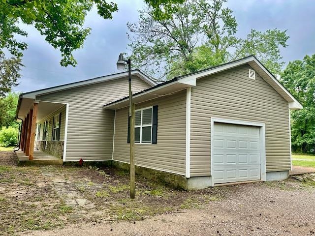 15 Brookwood Loop Adamsville, TN 38310 - Photo 15 of 21 a view of a house with a yard