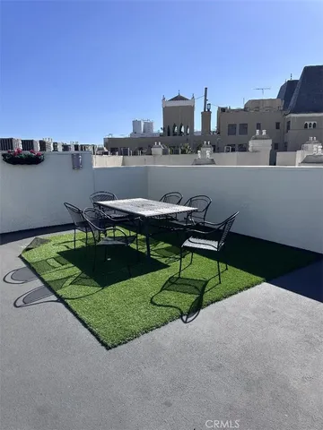 a view of a lake with a terrace