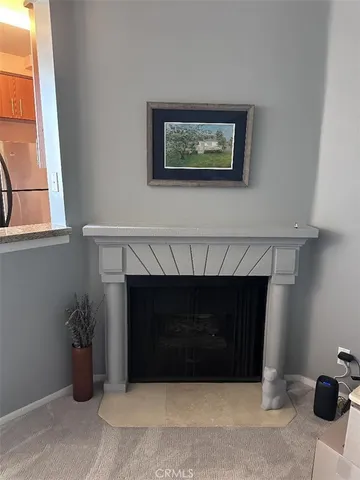 a living room with a fireplace