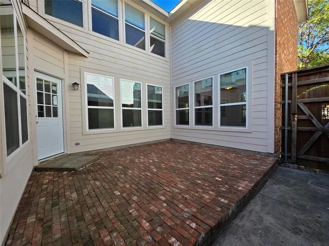 a view of swimming pool with outdoor seating and city view