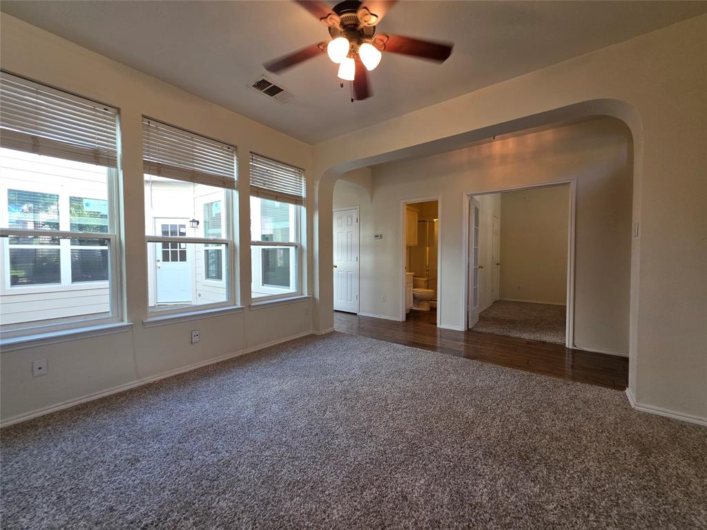 5413 Redwater Court The Colony, TX 75056 - Photo 7 of 40 a view of empty room with window