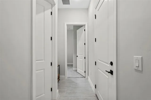 a view of a workspace with furniture