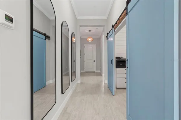 a kitchen with granite countertop cabinets stainless steel appliances and a sink