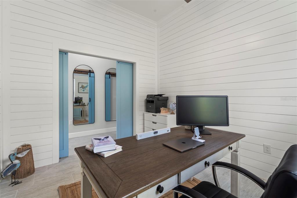 14560 Eagle Branch Drive Nokomis, FL 34275 - Photo 18 of 65 a view of a workspace with furniture
