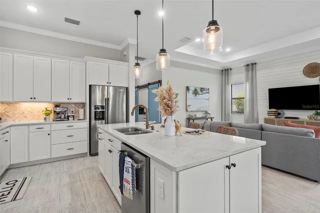 a view of a livingroom with furniture and window