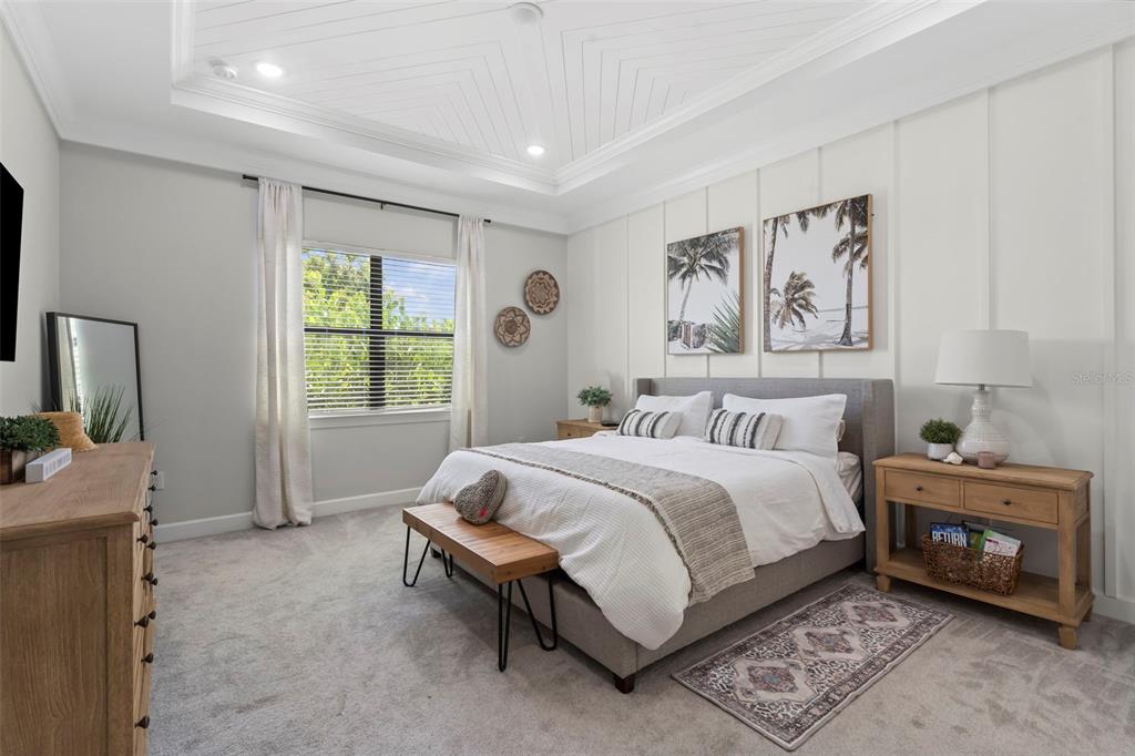 14560 Eagle Branch Drive Nokomis, FL 34275 - Photo 33 of 65 a spacious bedroom with a bed and a window