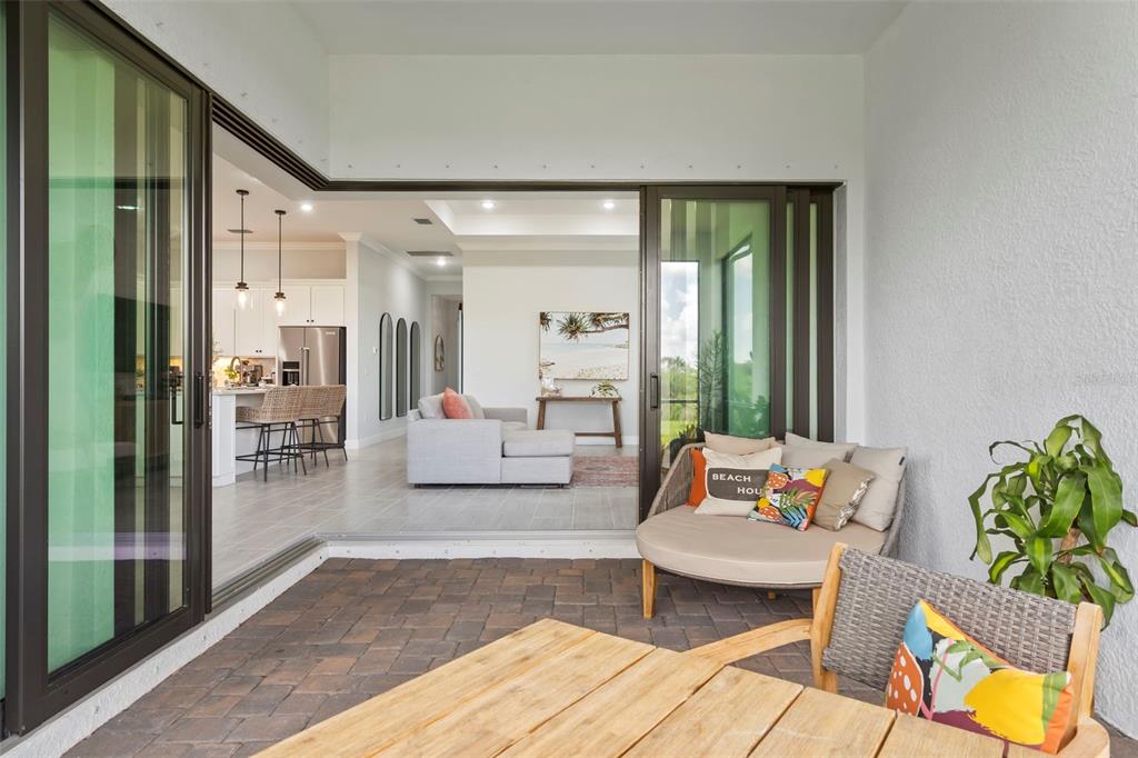 14560 Eagle Branch Drive Nokomis, FL 34275 - Photo 41 of 65 a living room with furniture and a large window