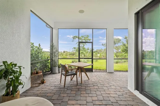 a house with swimming pool in front of it
