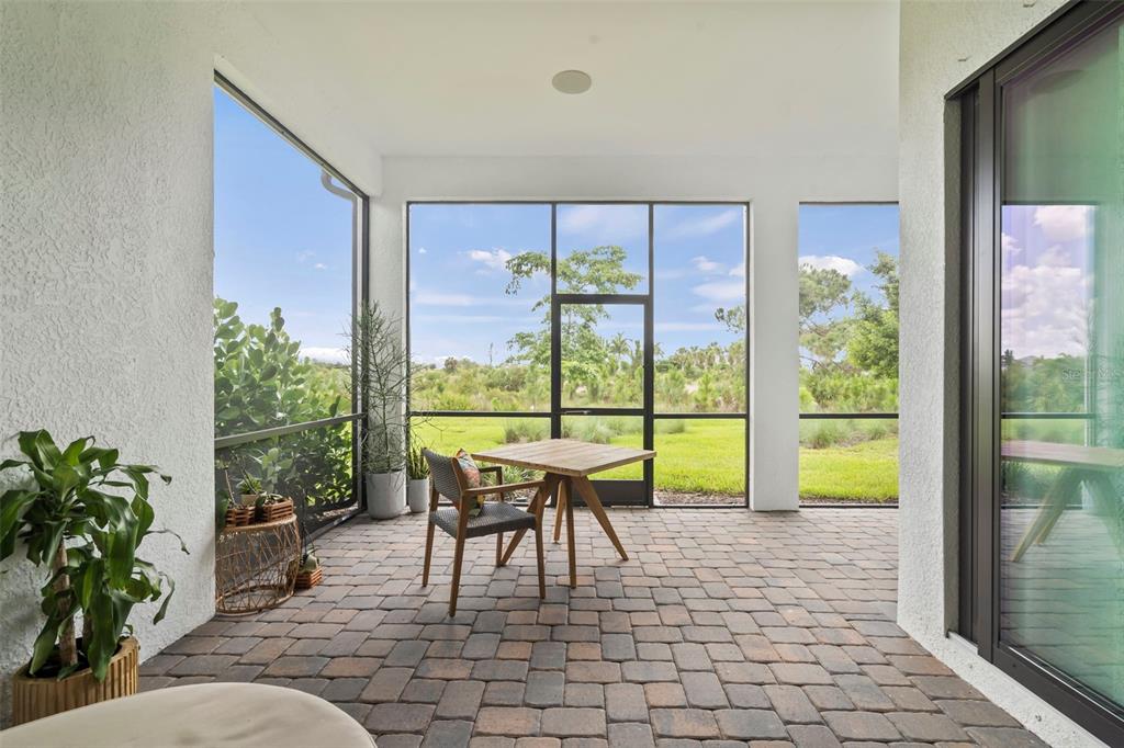 14560 Eagle Branch Drive Nokomis, FL 34275 - Photo 42 of 65 a balcony with furniture and a potted plant