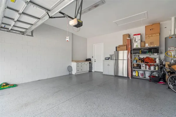 a front view of a house with yard and green space