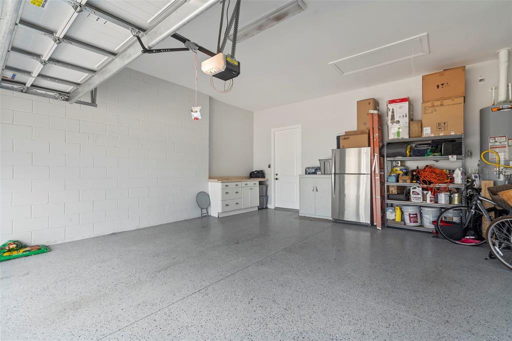 14560 Eagle Branch Drive Nokomis, FL 34275 - Photo 44 of 65 a view of a storage & utility room with lots of stuff