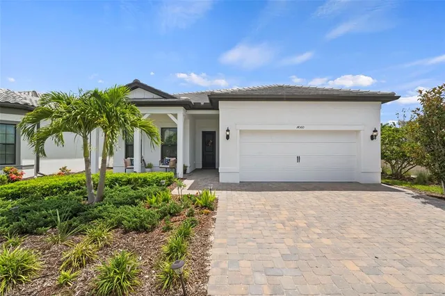 a view of a swimming pool with a yard