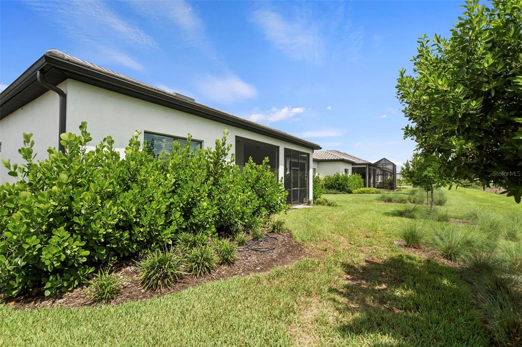 14560 Eagle Branch Drive Nokomis, FL 34275 - Photo 48 of 65 a view of a house with a yard