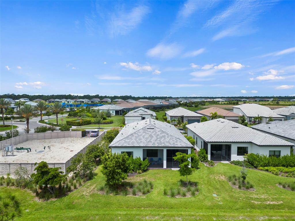 14560 Eagle Branch Drive Nokomis, FL 34275 - Photo 53 of 65 an aerial view of a house with a yard swimming pool and outdoor seating