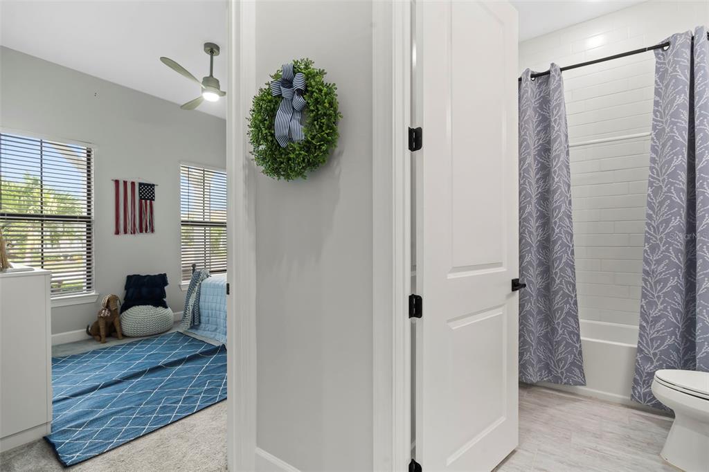 14560 Eagle Branch Drive Nokomis, FL 34275 - Photo 8 of 65 a living room with furniture and a rug