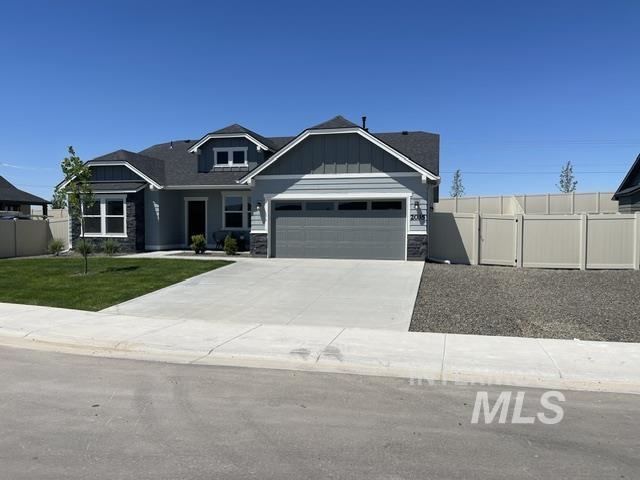 2035 Sumac Avenue Middleton, ID 83644 - Photo 2 of 17 Contemporary home featuring a dual-tone facade with stone accents and horizontal siding