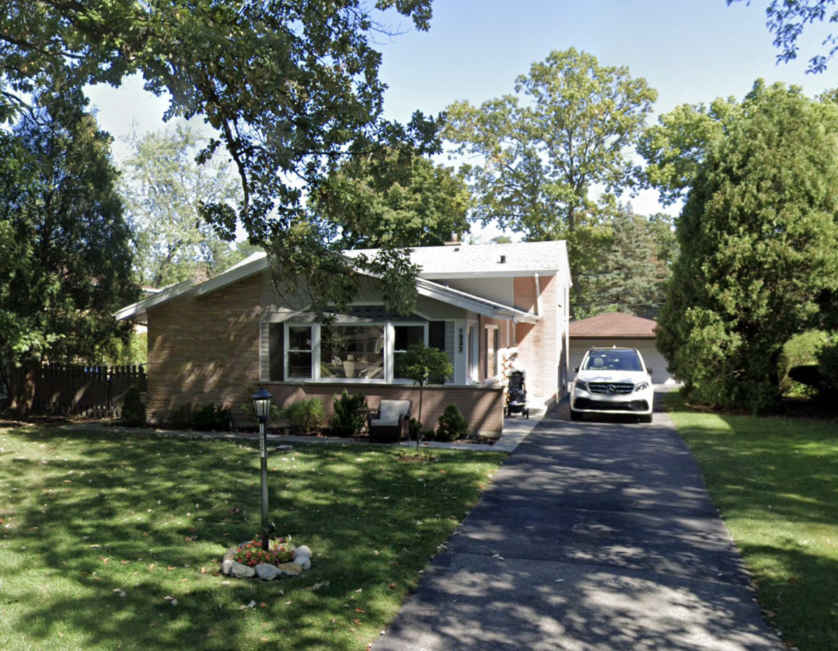 1237 Heatherfield Lane Glenview, IL 60025 - Photo 1 of 33 a front view of a house with garden