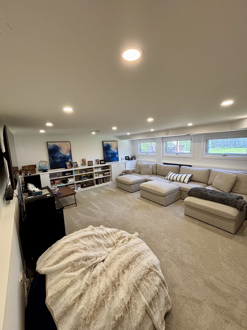 1237 Heatherfield Lane Glenview, IL 60025 - Photo 12 of 33 a living room with furniture and a wooden floor