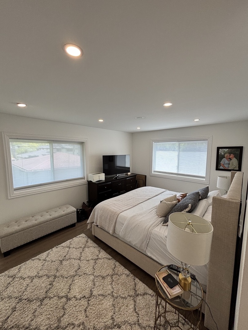 1237 Heatherfield Lane Glenview, IL 60025 - Photo 16 of 33 a bedroom with a bed and window