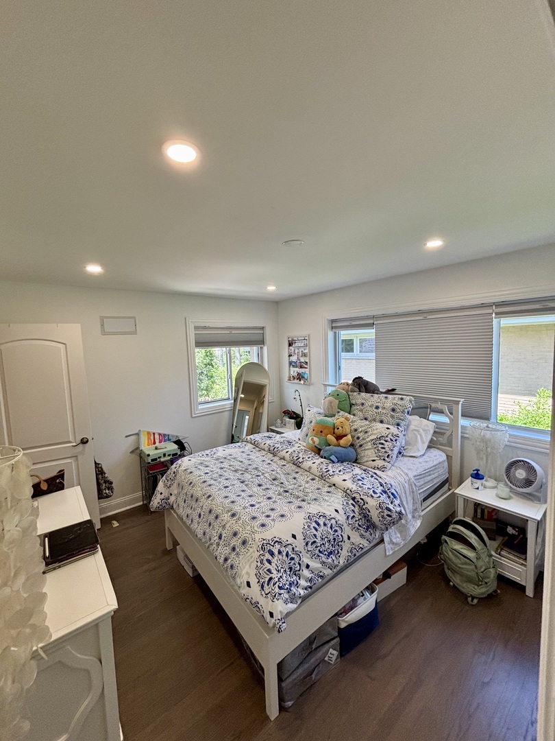 1237 Heatherfield Lane Glenview, IL 60025 - Photo 24 of 33 a bedroom with a bed and wooden floor