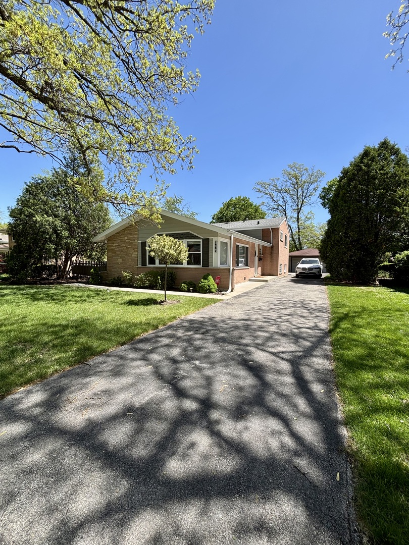 1237 Heatherfield Lane Glenview, IL 60025 - Photo 32 of 33 a view of house with yard