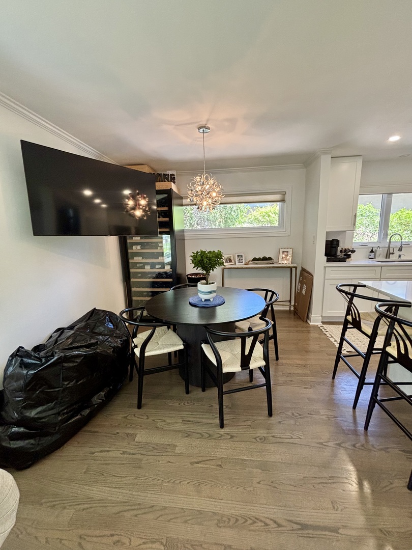 1237 Heatherfield Lane Glenview, IL 60025 - Photo 6 of 33 a living room with furniture and a flat screen tv