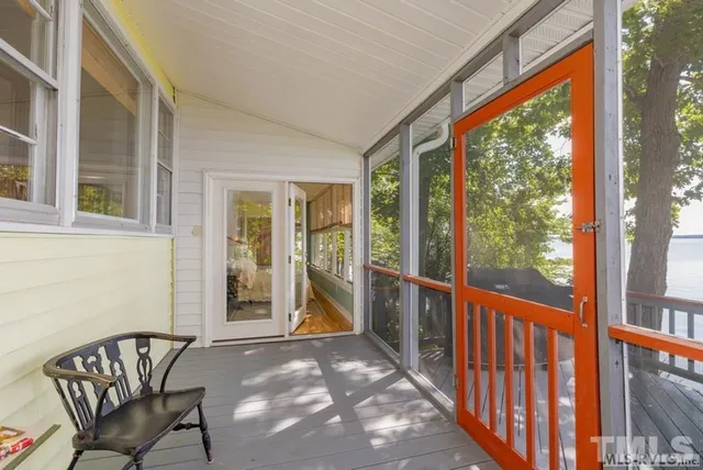 a view of a room with a large window