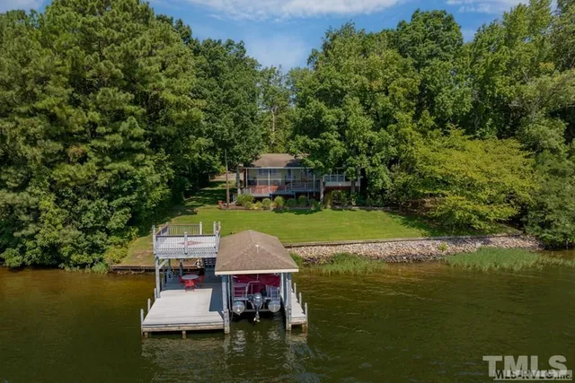 a view of a lake with a yard