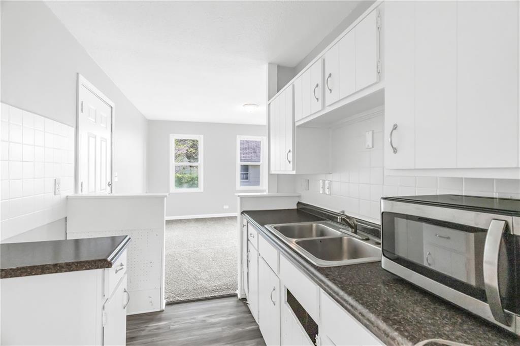 9815 James A Reed Road Kansas City, MO 64134 - Photo 5 of 26
