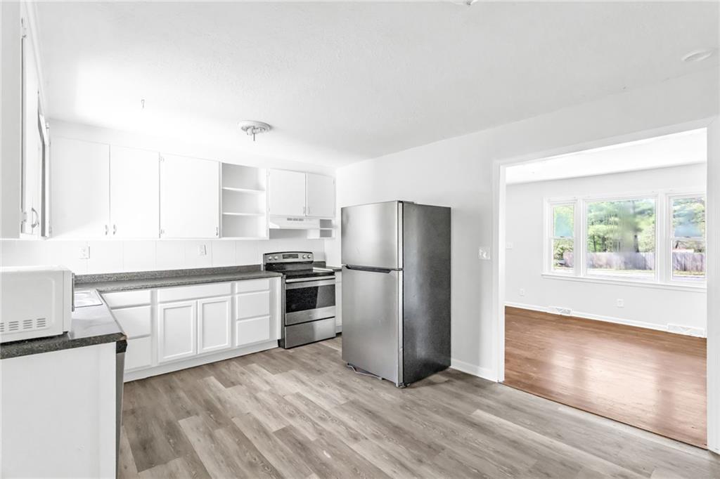 9815 James A Reed Road Kansas City, MO 64134 - Photo 6 of 26