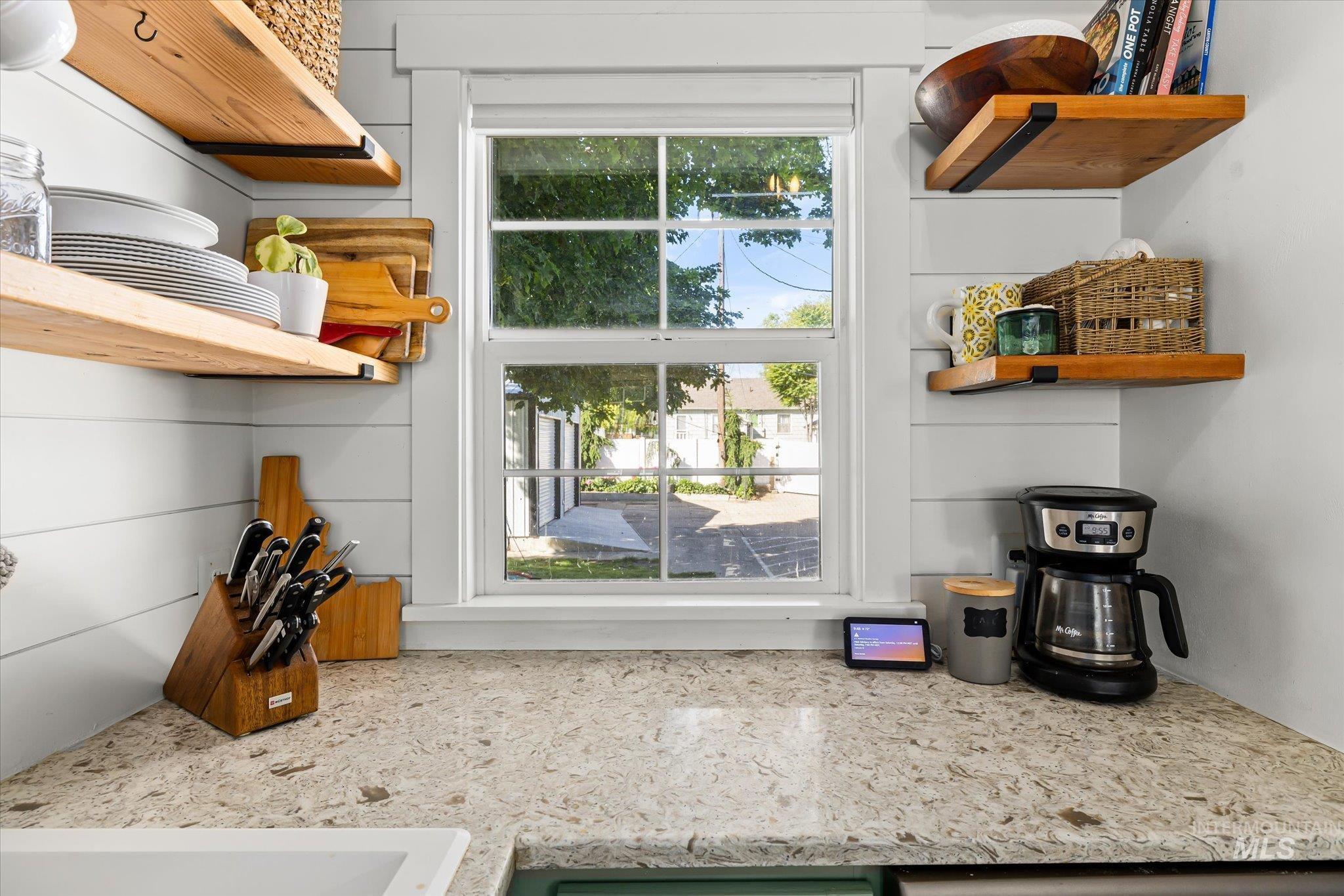 1008 Fillmore Street Caldwell, ID 83605 - Photo 30 of 50 Kitchen view of open shelves and light stone countertops
