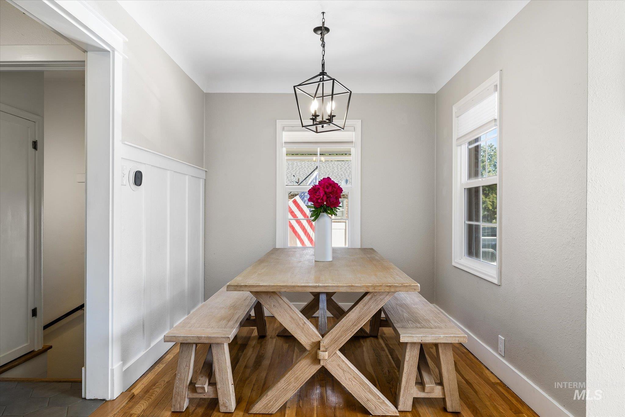 1008 Fillmore Street Caldwell, ID 83605 - Photo 40 of 50 Dining room featuring wood finished floors and a chandelier
