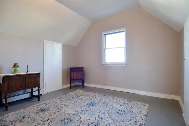 a room with furniture and a window