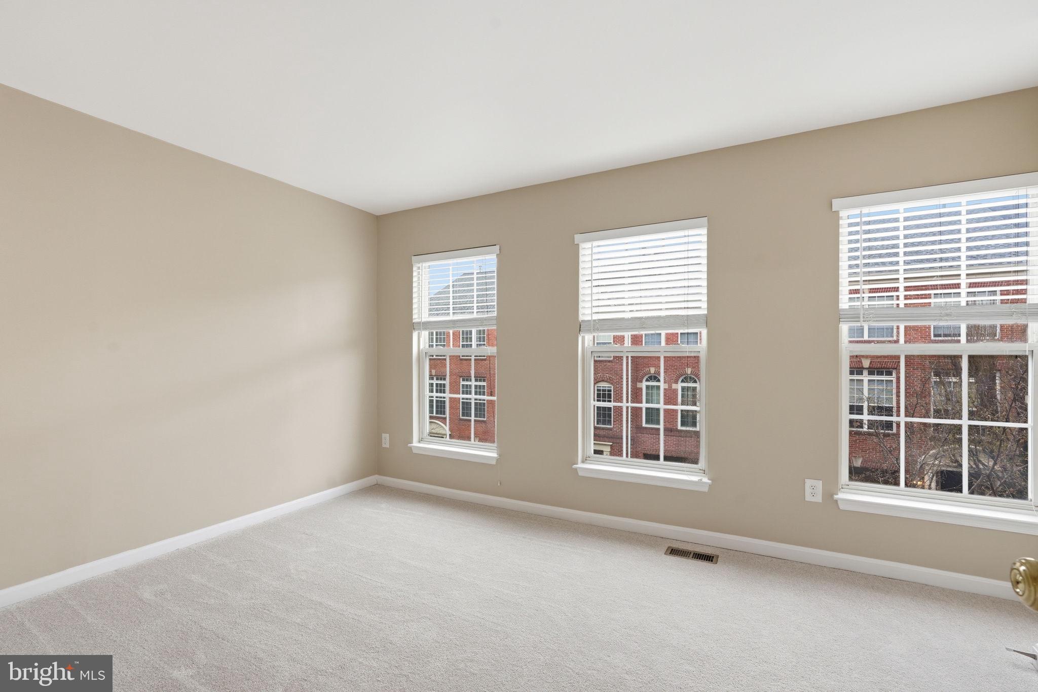 8074 Sebon Drive Vienna, VA 22180 - Photo 14 of 22 a view of an empty room with a window