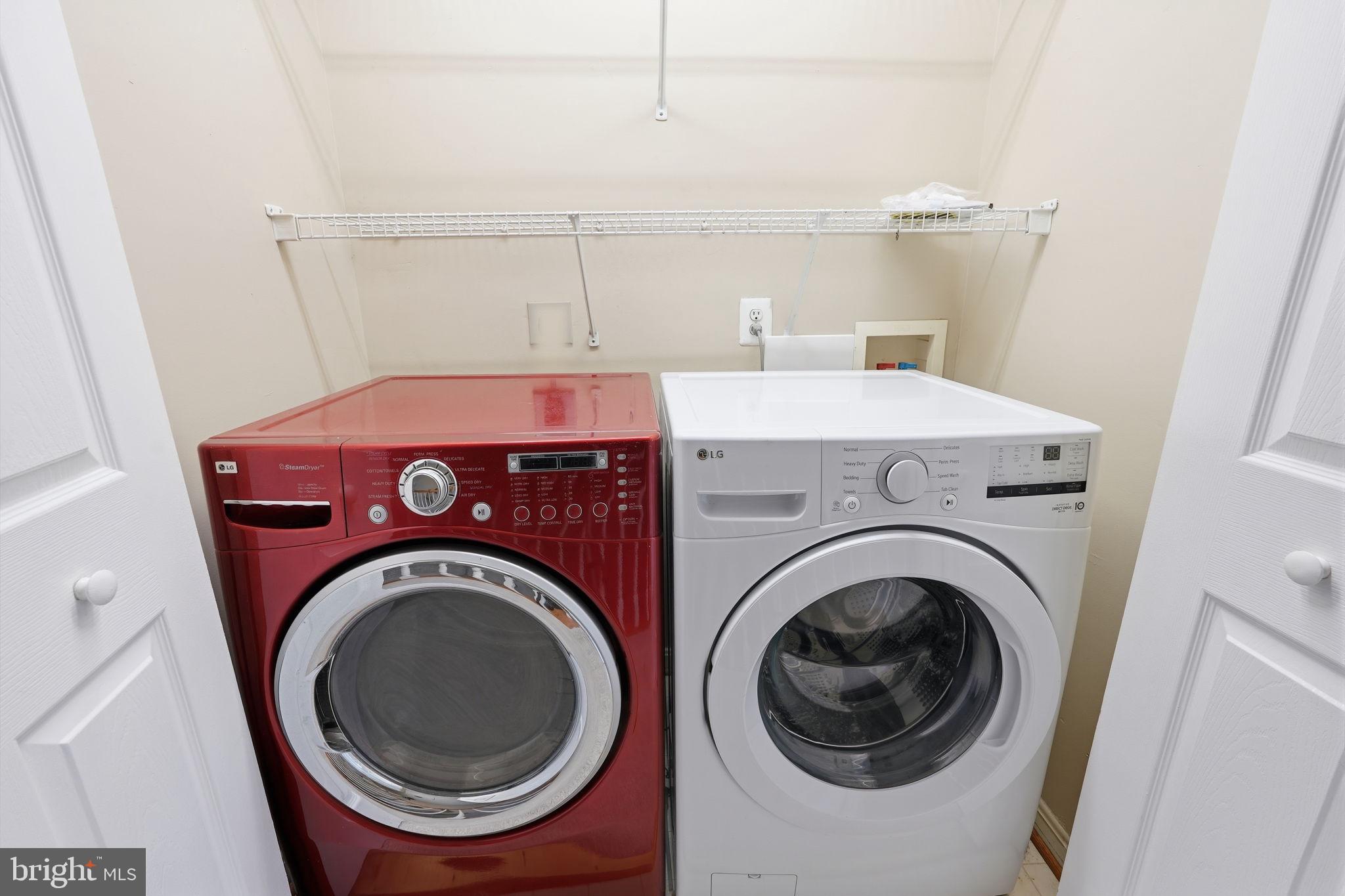 8074 Sebon Drive Vienna, VA 22180 - Photo 18 of 22 a utility room with dryer and washer
