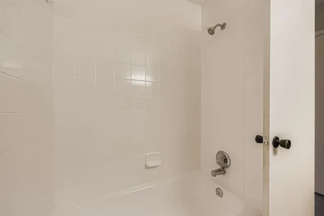 a bathroom with a bathtub
