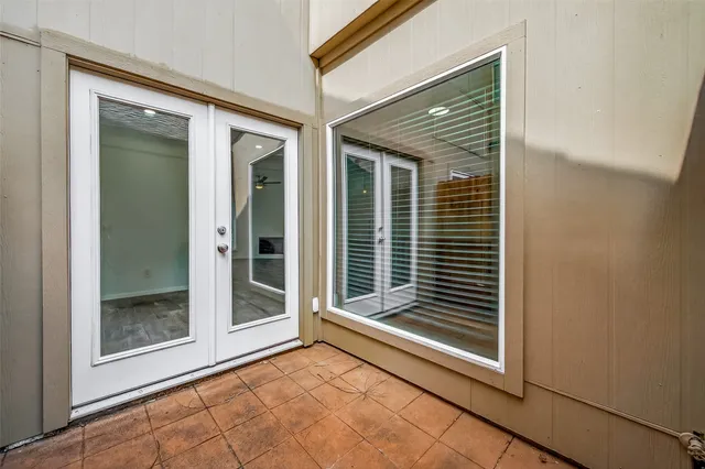 a front view of a building with a garage