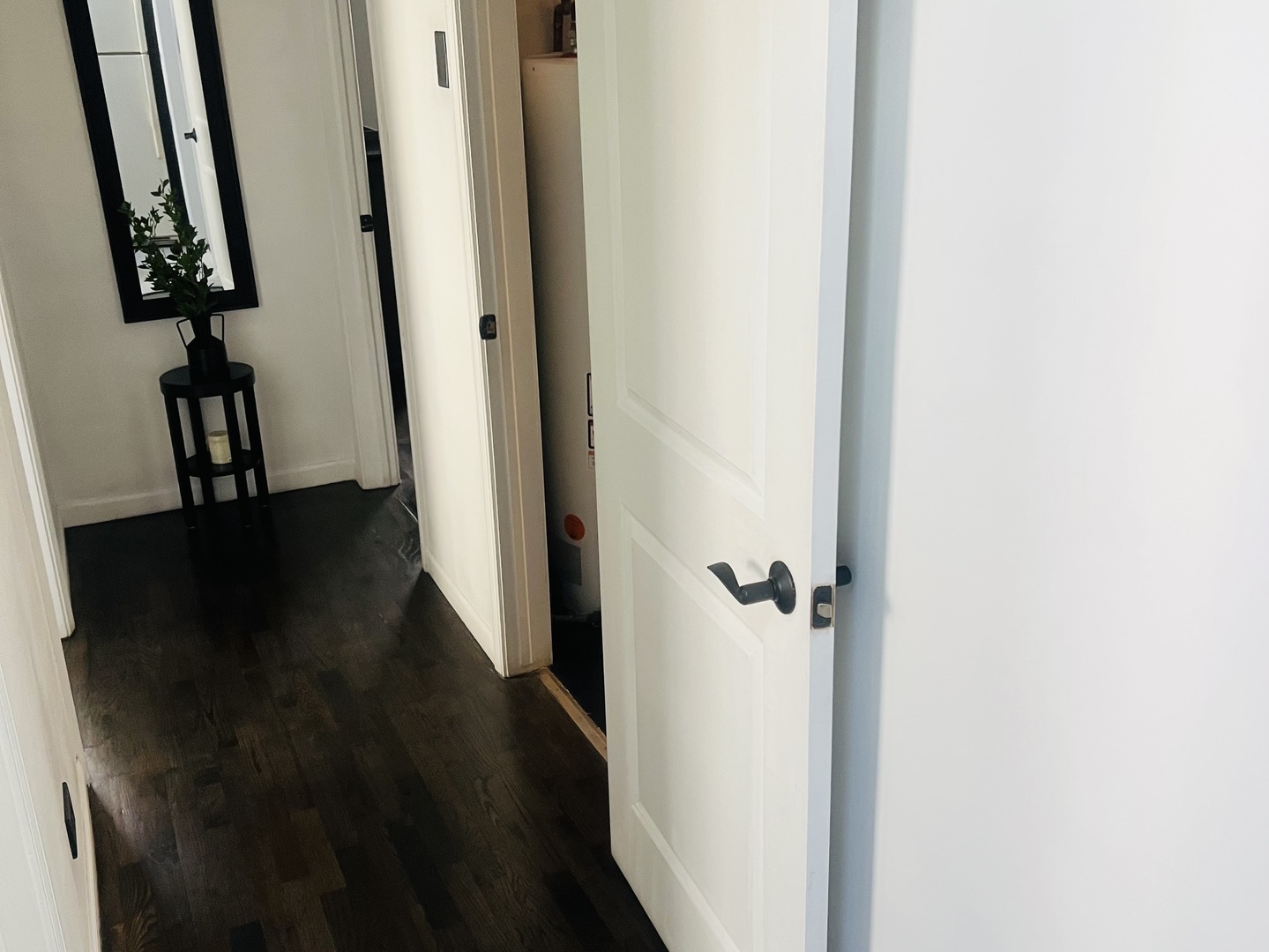 17831 Walter Street Lansing, IL 60438 - Photo 4 of 10 a view of a hallway with wooden floor