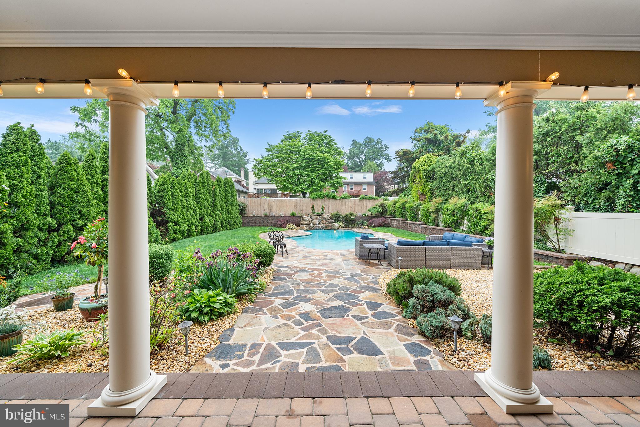 727 East Manoa Road Havertown, PA 19083 - Photo 2 of 68 a view of a yard with potted plants