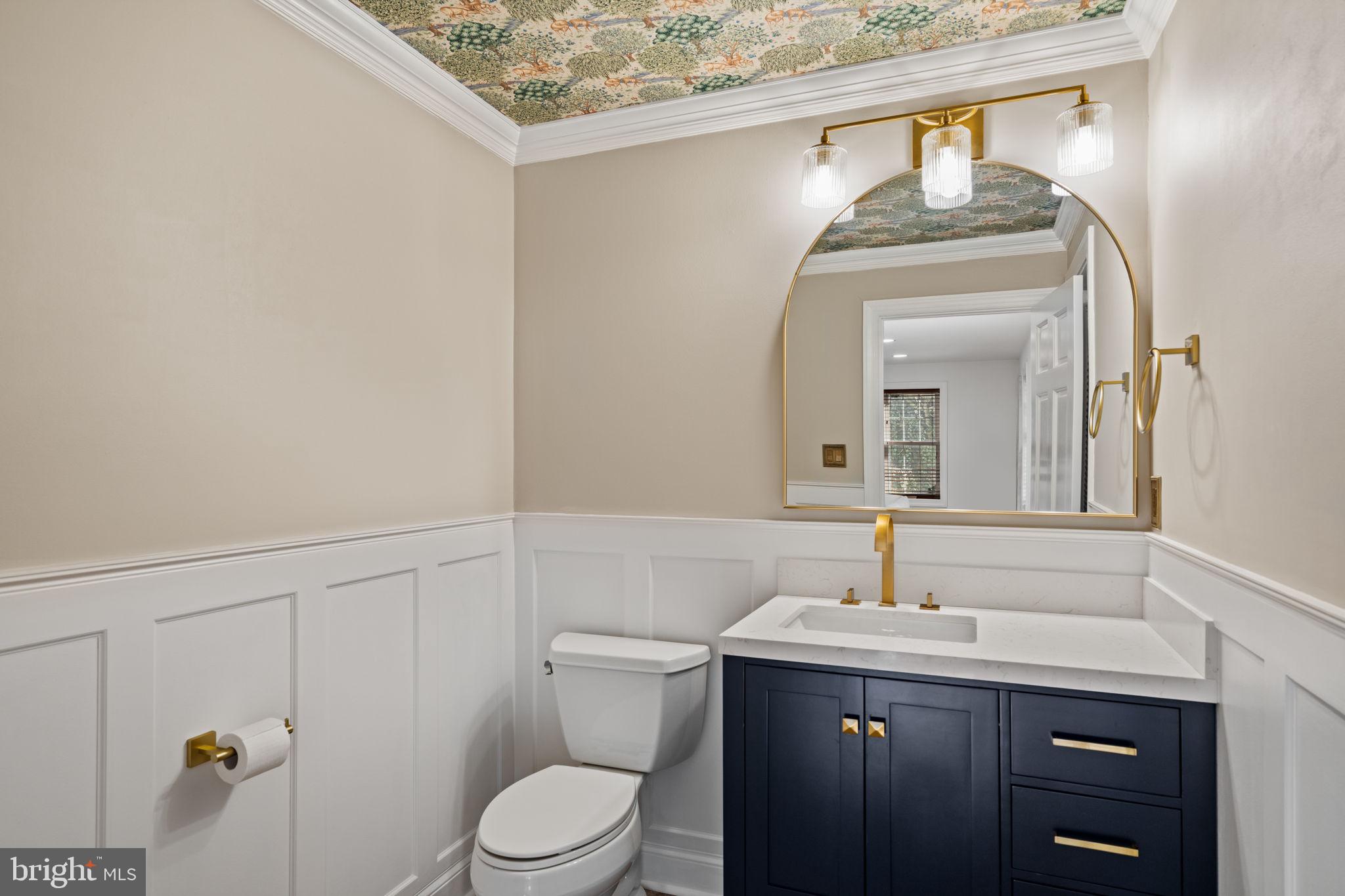 727 East Manoa Road Havertown, PA 19083 - Photo 25 of 68 a bathroom with a toilet sink and mirror