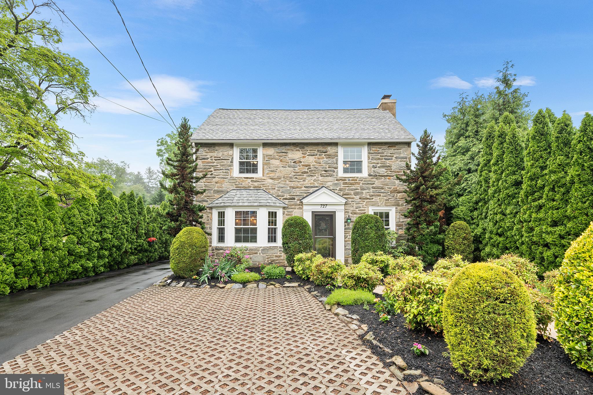 727 East Manoa Road Havertown, PA 19083 - Photo 4 of 68 a front view of a house with a yard