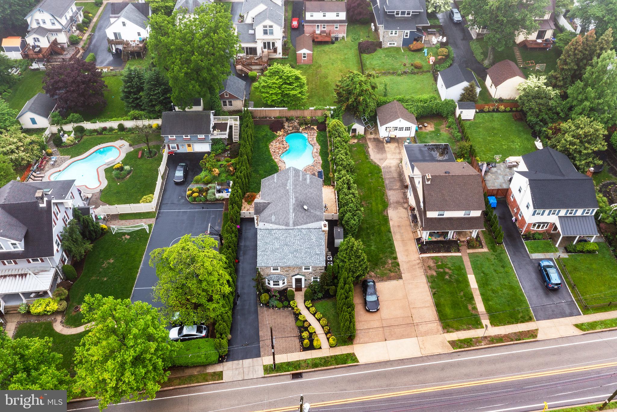 727 East Manoa Road Havertown, PA 19083 - Photo 5 of 68 an aerial view of multiple houses with yard