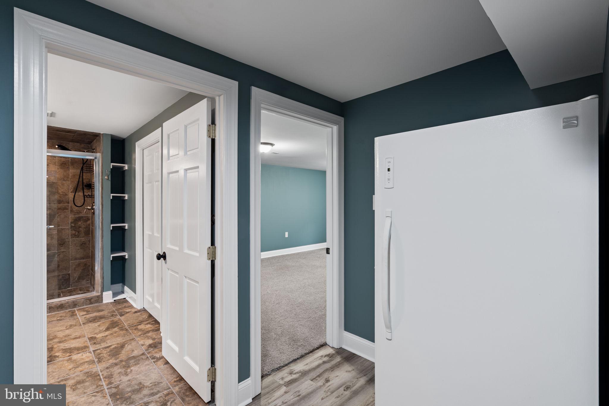 727 East Manoa Road Havertown, PA 19083 - Photo 51 of 68 a view of a hallway with two rooms
