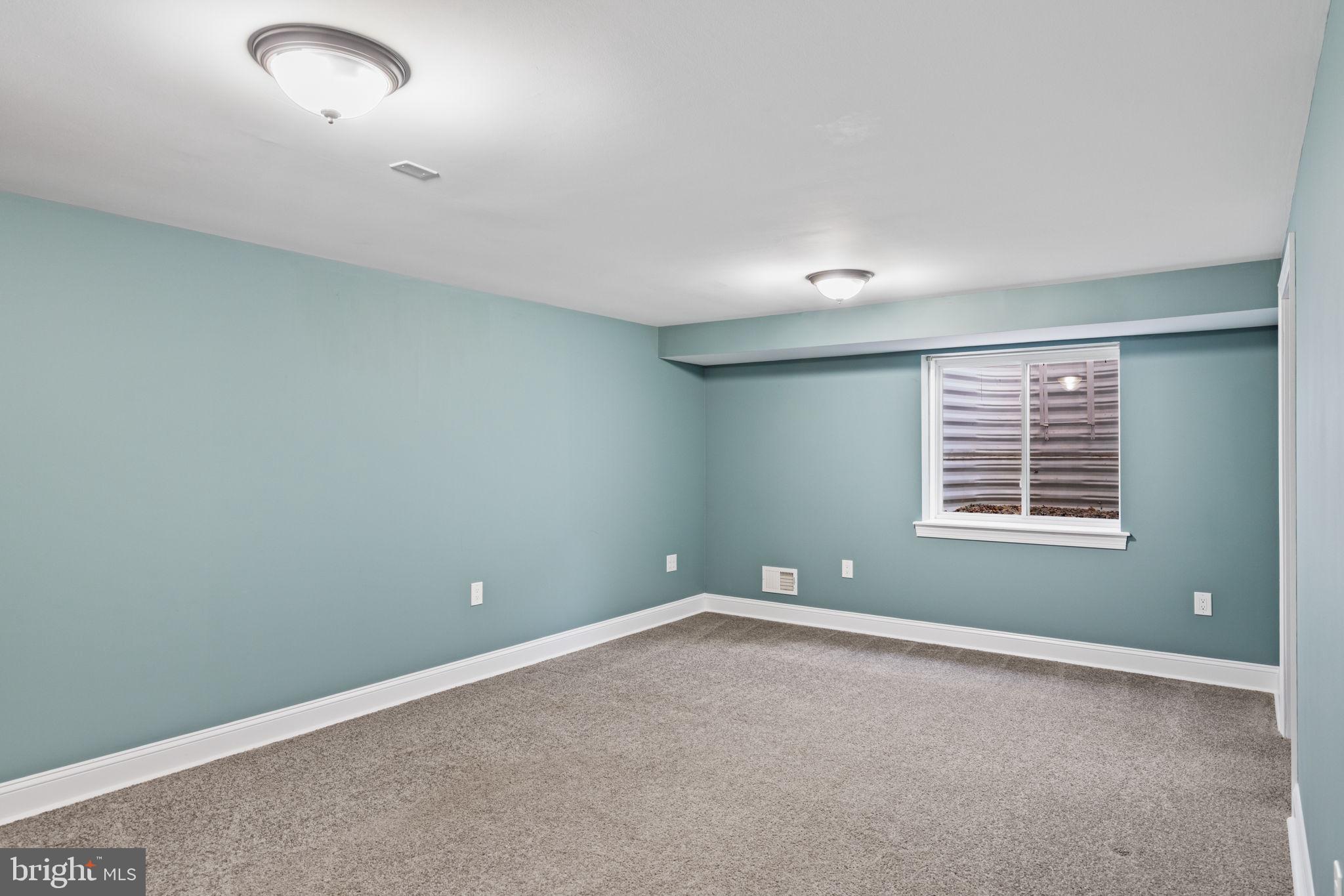 727 East Manoa Road Havertown, PA 19083 - Photo 52 of 68 an empty room with a window