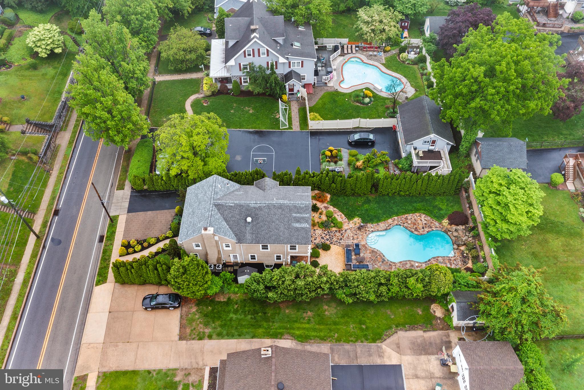 727 East Manoa Road Havertown, PA 19083 - Photo 62 of 68 an aerial view of a house with garden space and street view
