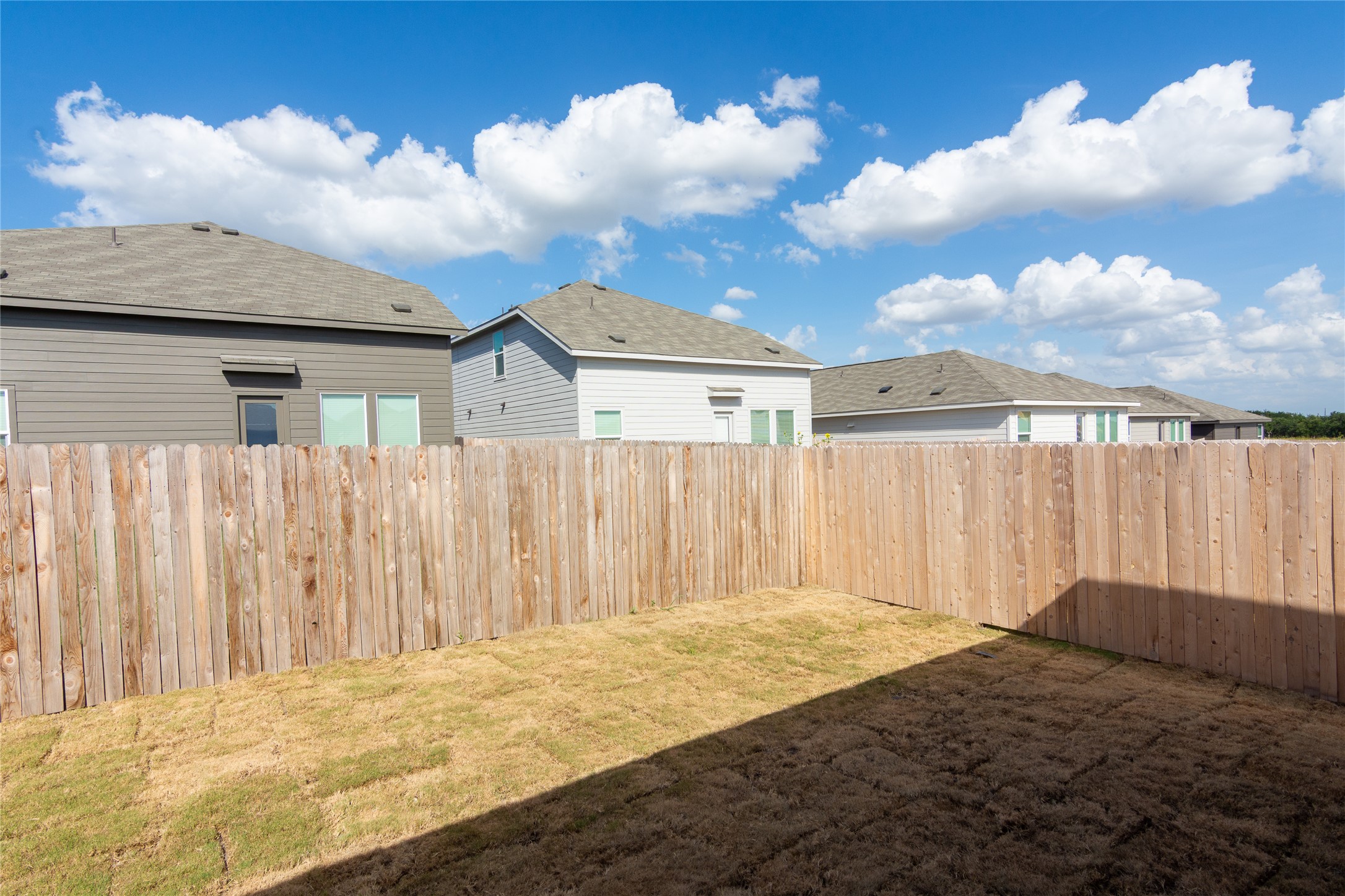 149 Star Packer Lane Jarrell, TX 76537 - Photo 28 of 30 Secure yard space, perfect for outdoor enjoyment and privacy.