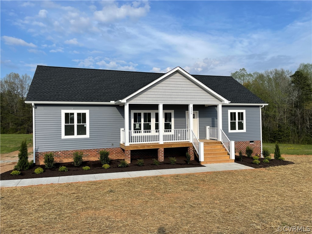 3324 Three Chopt Road Gum Spring, VA 23065 - Photo 2 of 43 a front view of a house with a yard