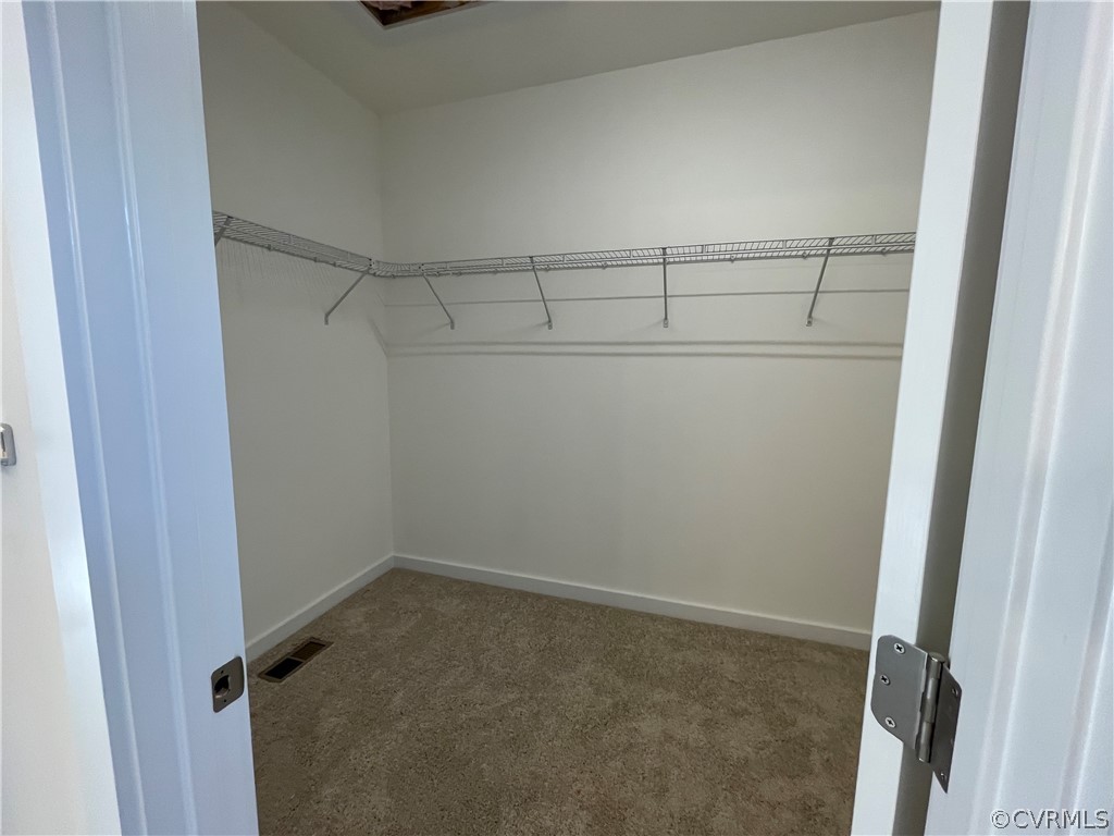 3324 Three Chopt Road Gum Spring, VA 23065 - Photo 27 of 43 a view of a room with racks on the wall