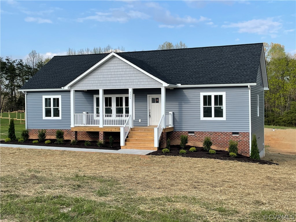 3324 Three Chopt Road Gum Spring, VA 23065 - Photo 3 of 43 a front view of a house with a yard