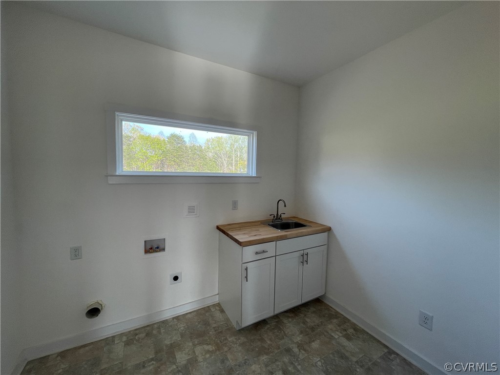 3324 Three Chopt Road Gum Spring, VA 23065 - Photo 35 of 43 a utility room with window
